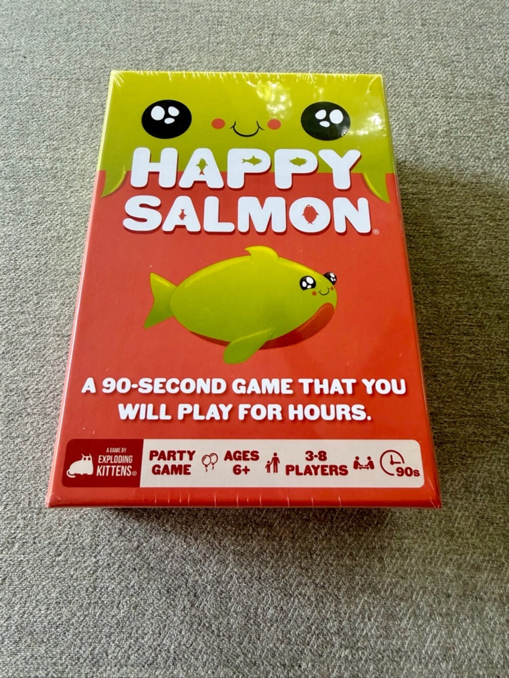 Exploding Kittens Happy Salmon Party Game — Red & Yellow